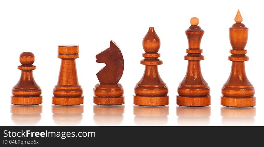 Chess. a group of black wooden chess pieces