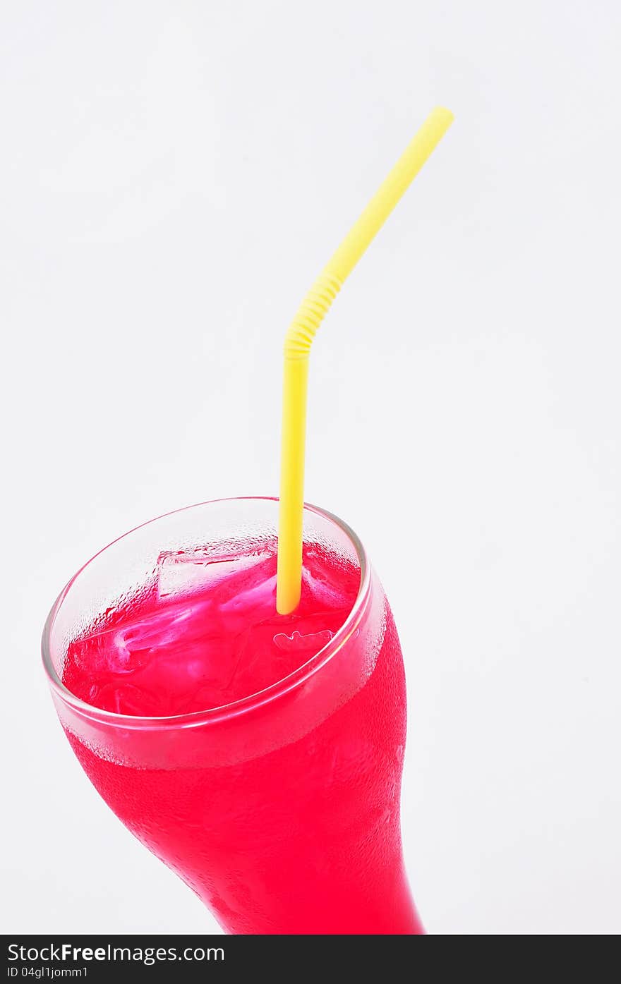 A glass of beverage , white background