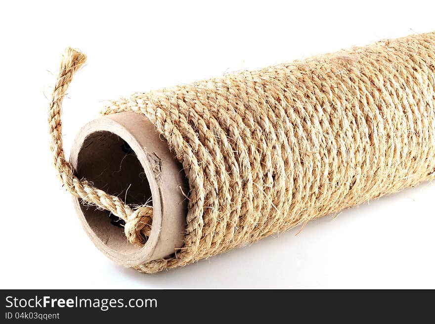 Rough rope wound on a cardboard tube and tied to a node