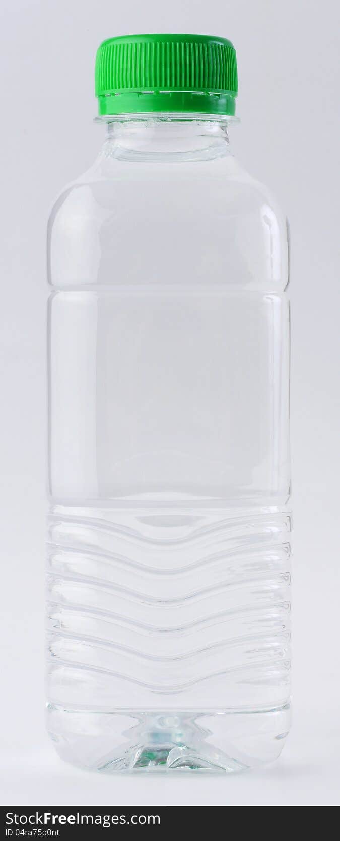 Drinking water in clear bottle on white