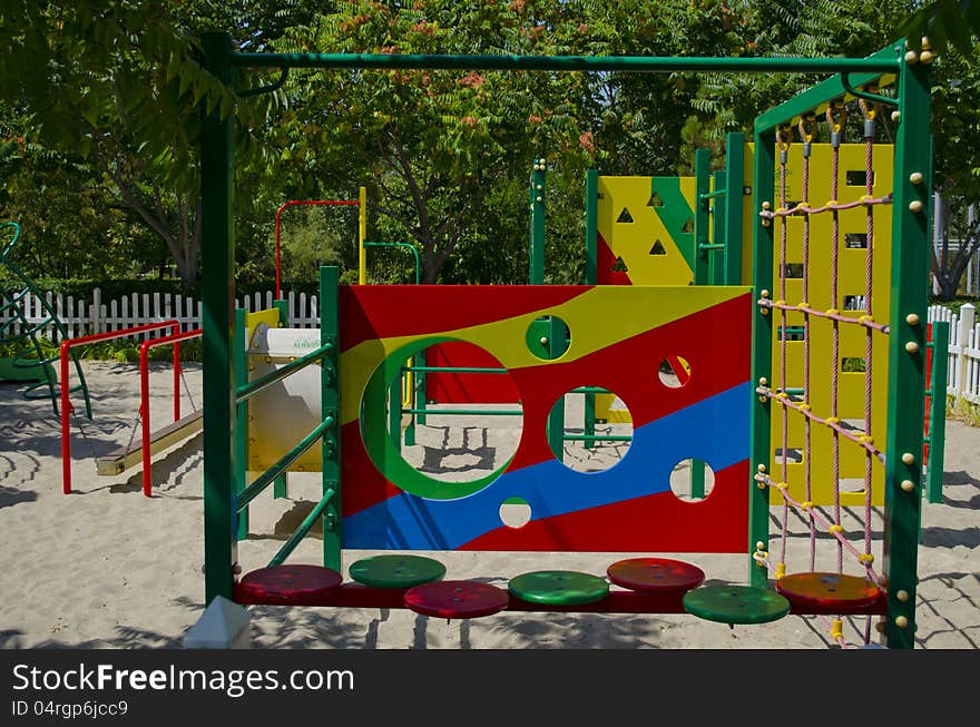 Fine playground with various attractions among trees