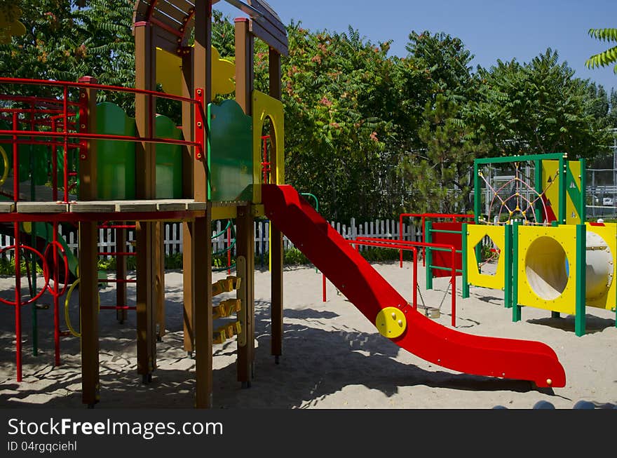 Fine playground with various attractions among trees