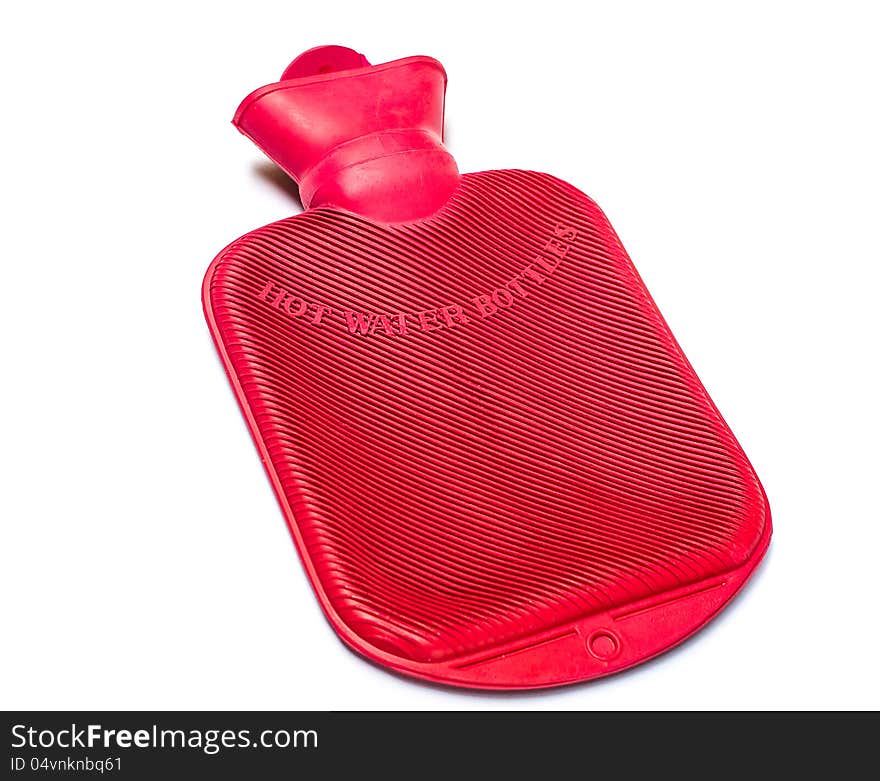 A red hot water bottle on white background