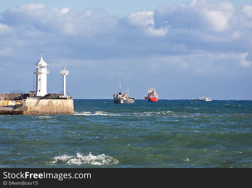 Ships on the roads of port during storms