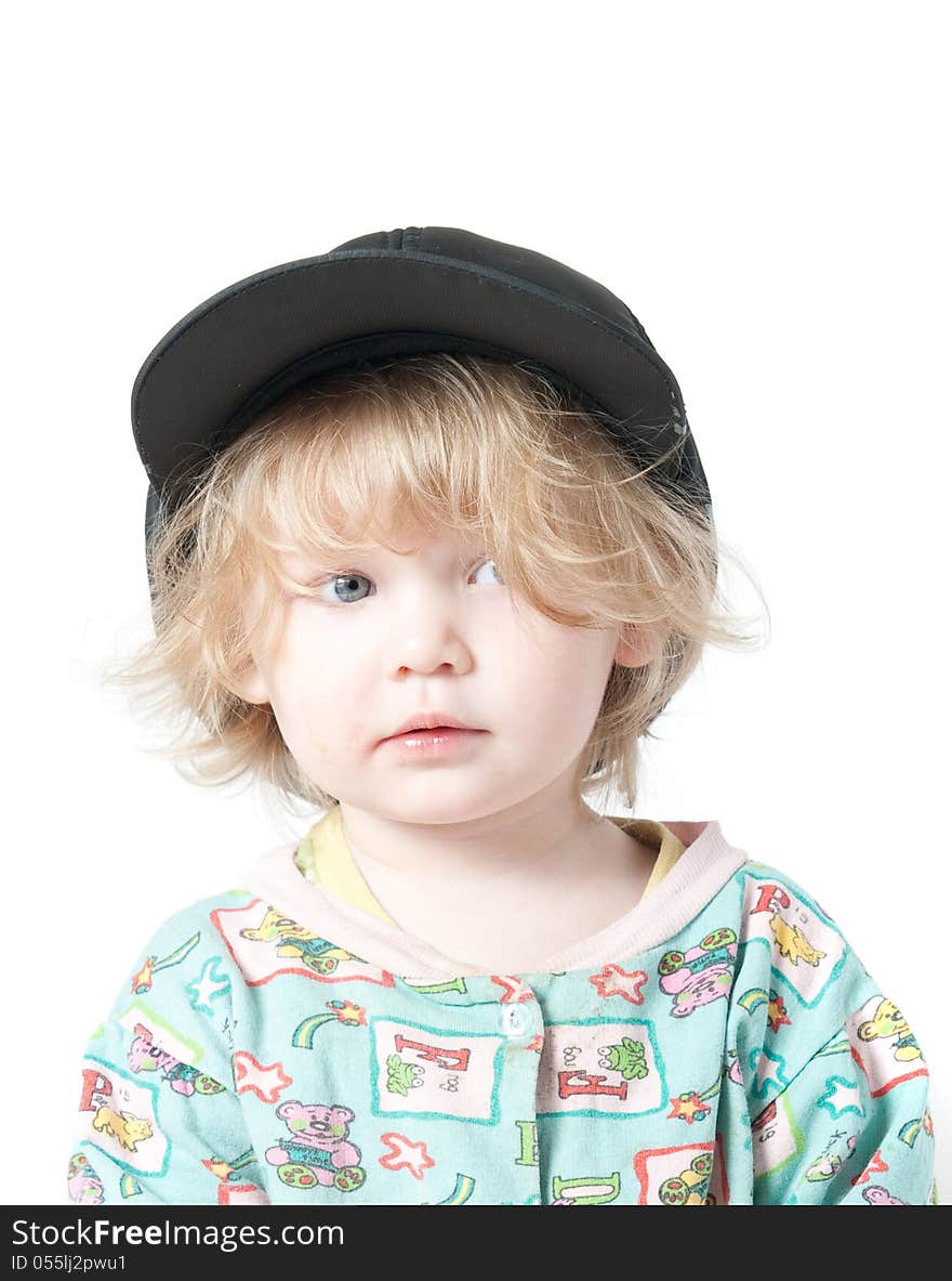 A child in a cap. A child in a cap. Clipping path.