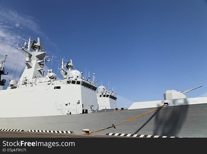 The military ships lie alongside after a long campaign. The military ships lie alongside after a long campaign