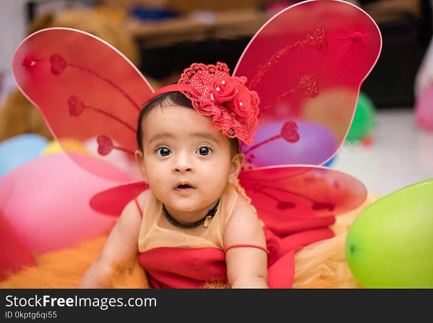 Indian baby dressed as an angel