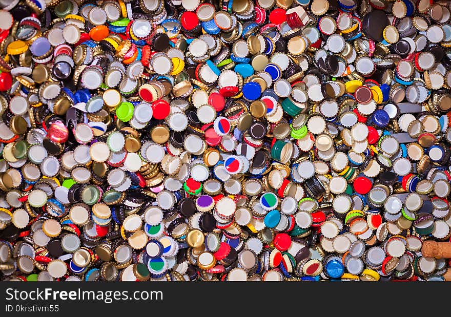 Pile of used soda plugs. Pile of used soda plugs