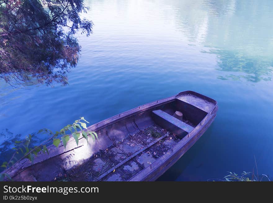 Row boat in calm blue and clear water. Row boat in calm blue and clear water