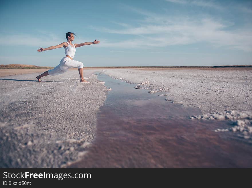 Young girl doing yoga outdoors