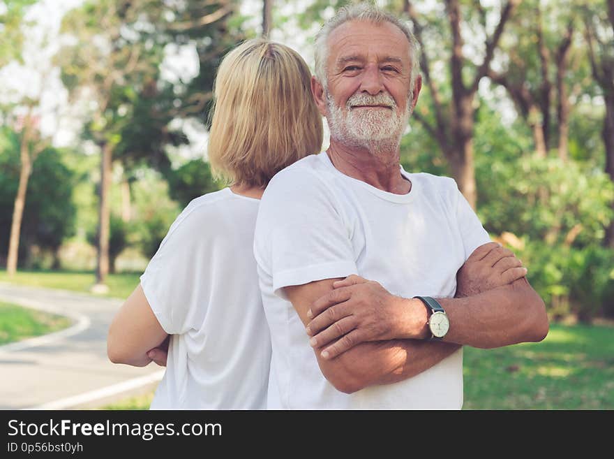 Happy senior couple relax in the park