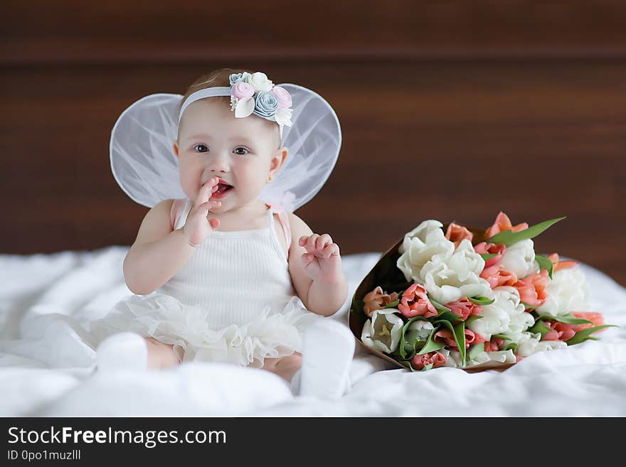 Happy little baby with angel wings