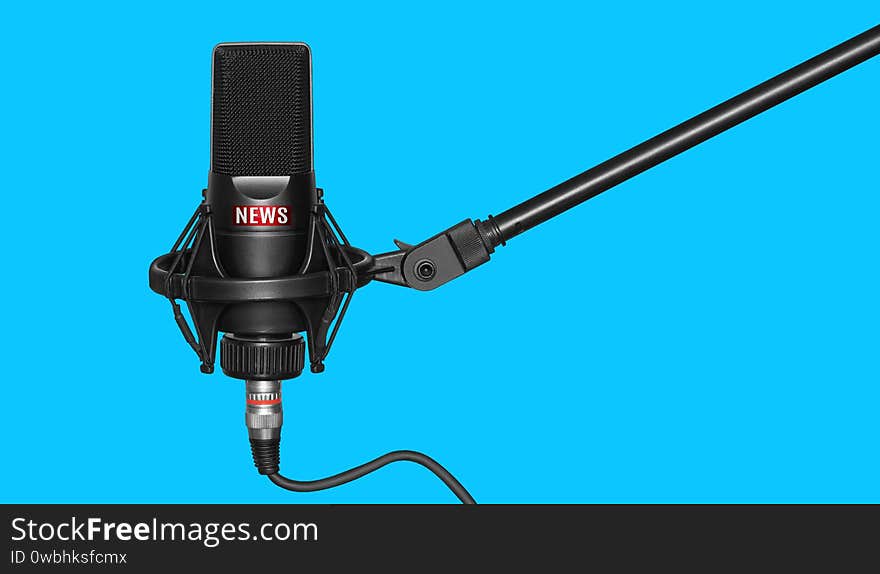 Professional black microphone with news logo isolated on blue background