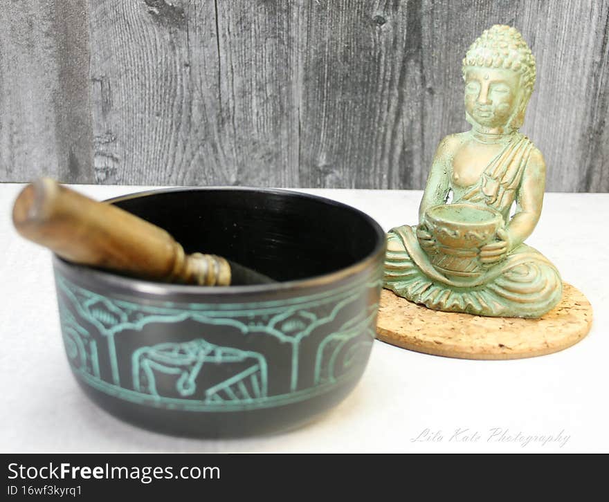 TIme to meditate, unwind, destress, focus, be mindful, practice patience, empathy, devotion, self time,  with a few items to help initiate.  buddha statue, tibetian singing bowl, with stick to make noise,  Meditation, peace, finding peace, joy, happiness. TIme to meditate, unwind, destress, focus, be mindful, practice patience, empathy, devotion, self time,  with a few items to help initiate.  buddha statue, tibetian singing bowl, with stick to make noise,  Meditation, peace, finding peace, joy, happiness.