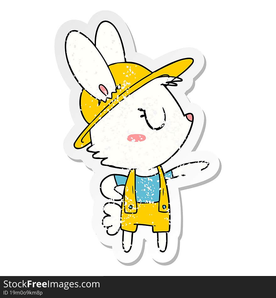 distressed sticker of a cartoon rabbit construction worker