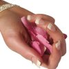 Mancured Hand Holding Flower petals