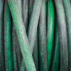 Closeup of old garden hose.