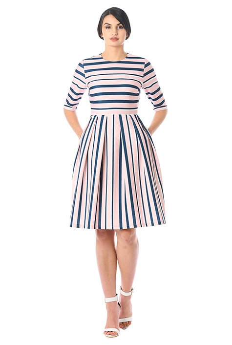 Stripes add modern attitude to our scuba knit dress in a flattering fit-and-flare silhouette for day-to-evening versatility.