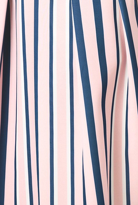 Stripes add modern attitude to our scuba knit dress in a flattering fit-and-flare silhouette for day-to-evening versatility.