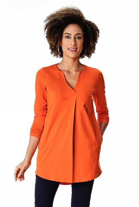 Smart, comfortable and versatile, our cotton-knit tunic with its easy fit, box-pleat front, and shirttail hem makes it stylish, and side seam pockets add a practical dimension. 