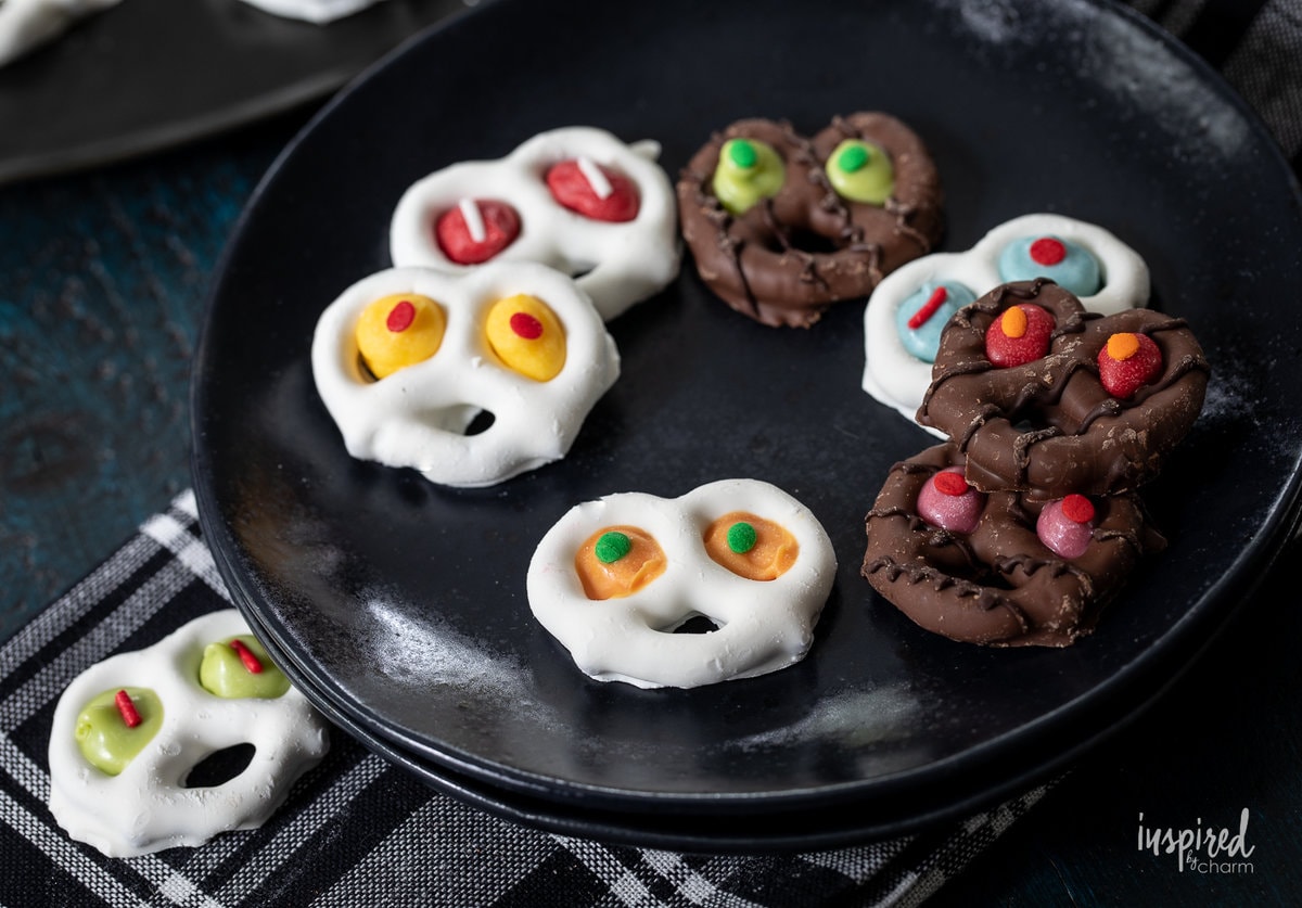 Spooky Halloween Pretzels on a plate.