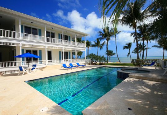 Large private estate ocean front home with beach side pool