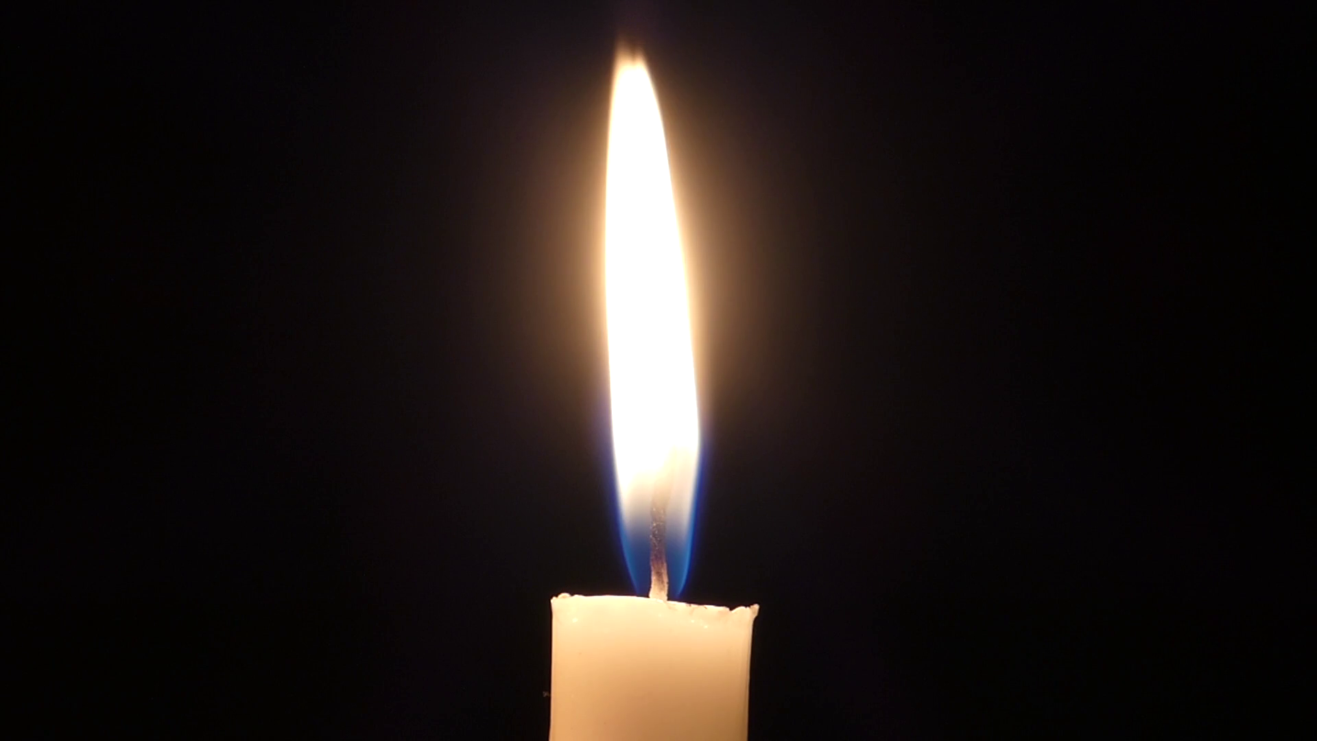 a Lit Candle Flame Blinking at Night. Stock Video Footage - Videoblocks