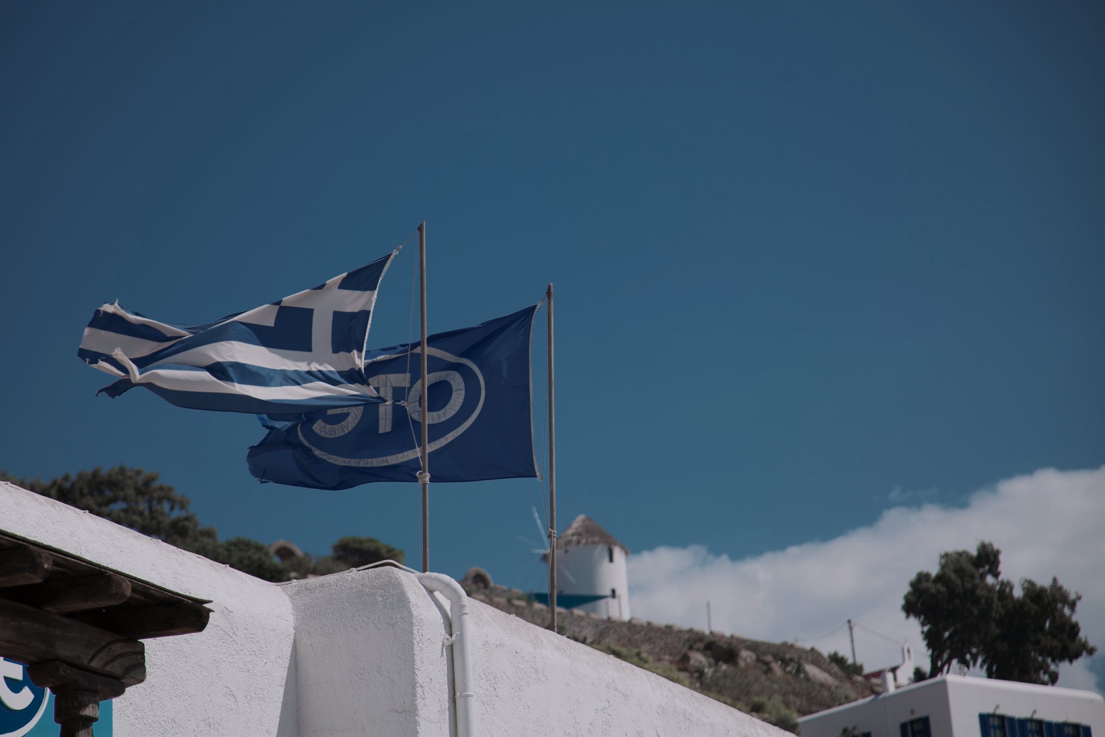 Fluttering flags on the building photo