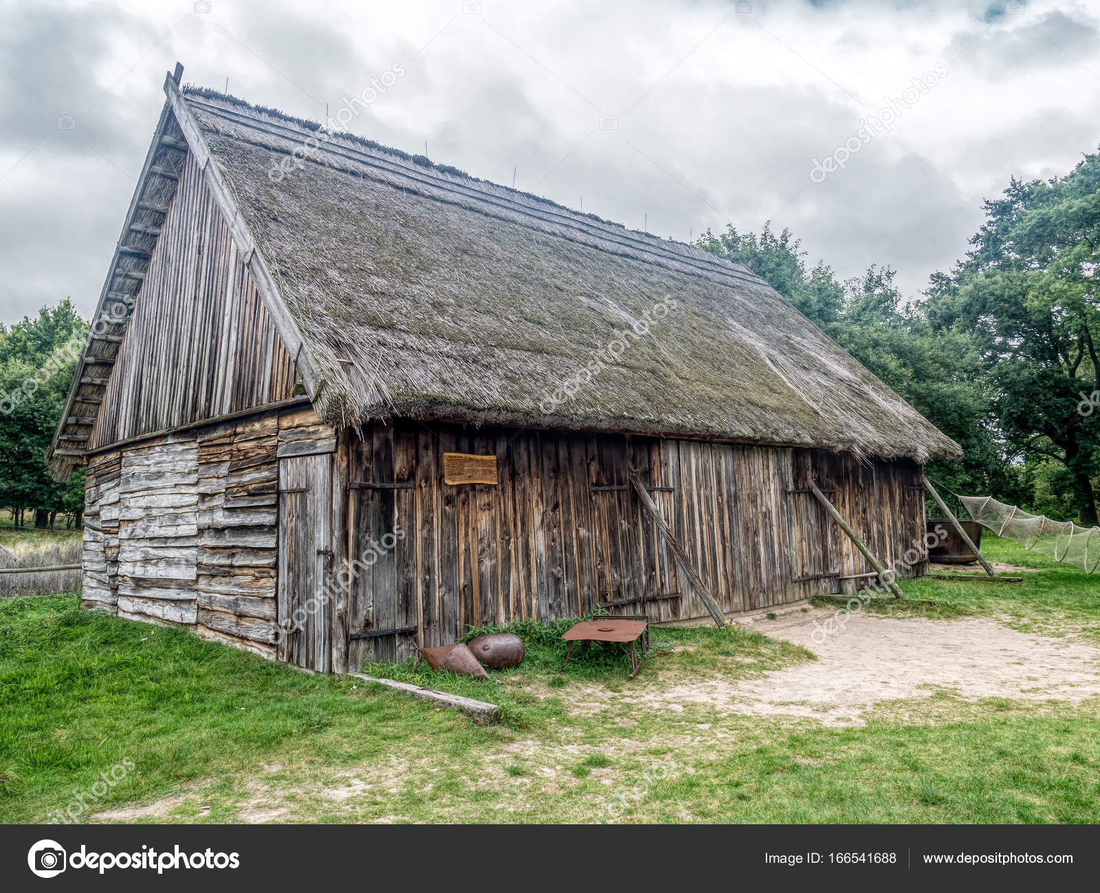 Old wooden barn in Kluki, Poland — Stock Photo © pryzmat #166541688