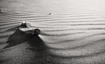 Empty plastic bottle on beach