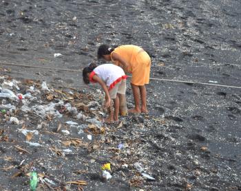 Kids Searching Stuff on The Beach