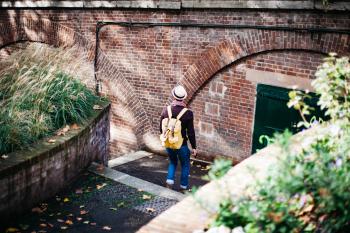 Man With Brown Backpack