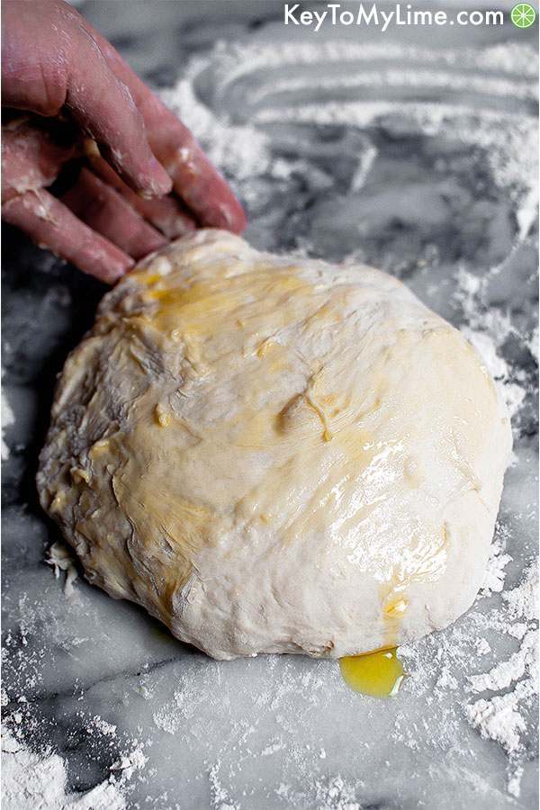 Oiled pizza dough ball.