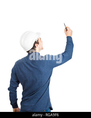 Rear view young man engineer wearing protective helmet pencil drawing isolated over white background with copy space. Stock Photo