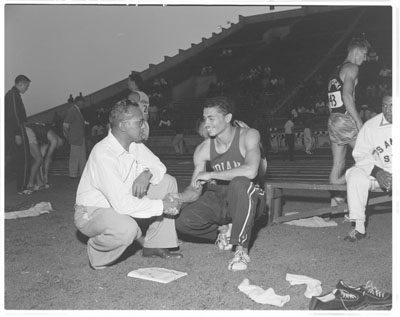 Greg Bell received congratulations at the 1957 NCAA Championship