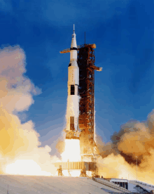 a rocket is being launched with the letters apollo on the front