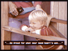 a little boy sitting on a wooden railing with the words " be proud for what your good heart 's won "