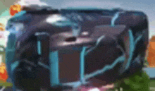 a blurry picture of a blue and black box with a lightning design .