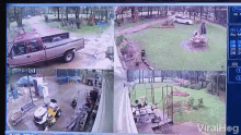 a screen shows a truck and a lawn mower and the words viralhog at the top