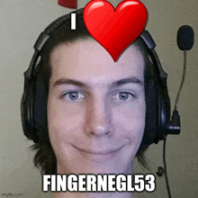 a man wearing headphones has a red heart on his head and says i love finger negl53