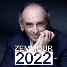 a poster for zemmour 2022 with a man in a blue suit