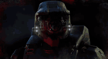 a close up of a video game character 's helmet with a red face