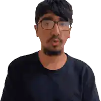 a man with glasses and a beard is making a surprised face