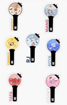 there are many different types of bts light sticks with different characters on them .