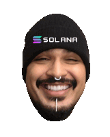 a man with a beard wears a black beanie with solana written on it