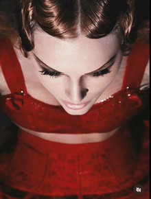 a close up of a woman 's face with the letter z on the bottom right
