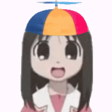 a girl wearing a colorful hat with a propeller on top of it