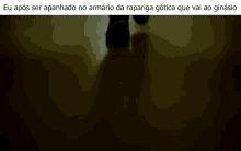 a shadow of a person walking in a dark room with a caption in portuguese