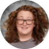 a young woman with curly hair and glasses is smiling in a circle .