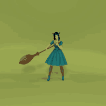 a woman in a blue dress holding a broom